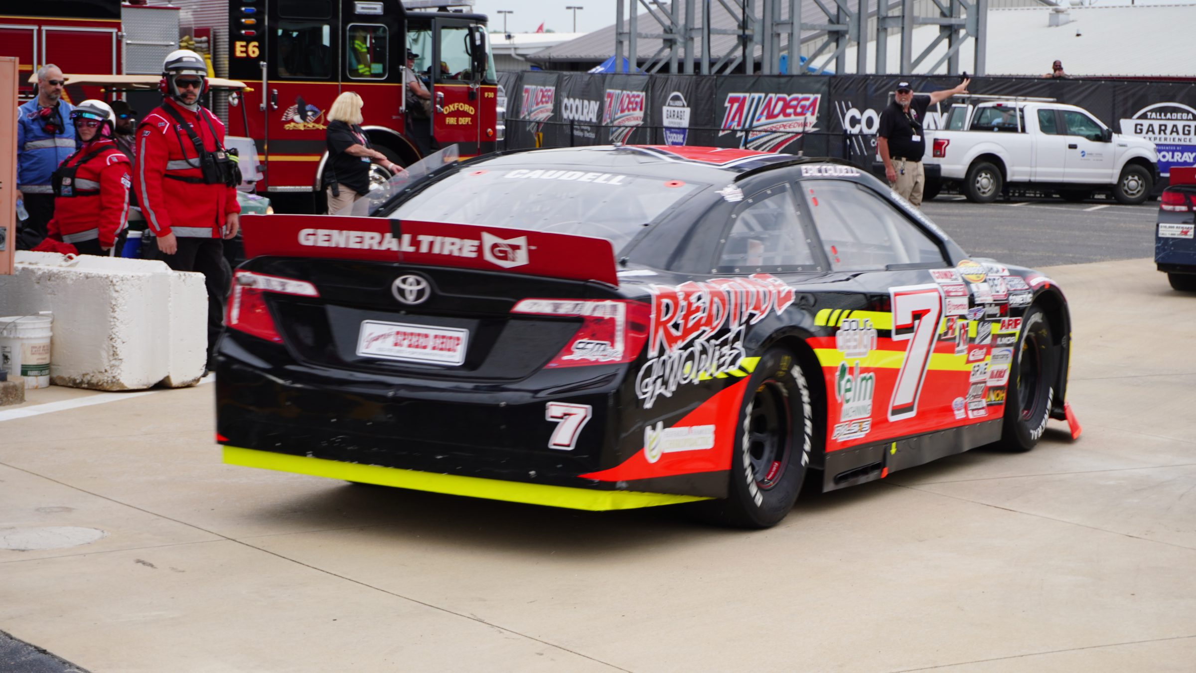 The car in the pit box between runs